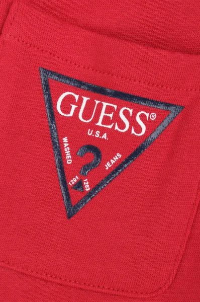 Teplákové kalhoty Guess červený