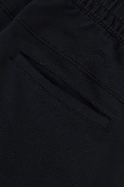 Teplákové kalhoty EA7 tmavě modrá
