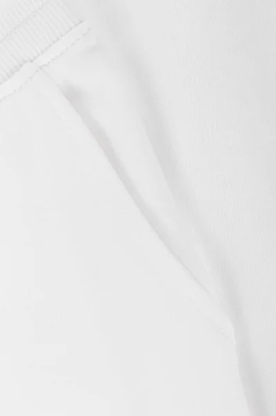 Teplákové kalhoty Armani Exchange bílá